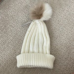 Cream beanie with pom